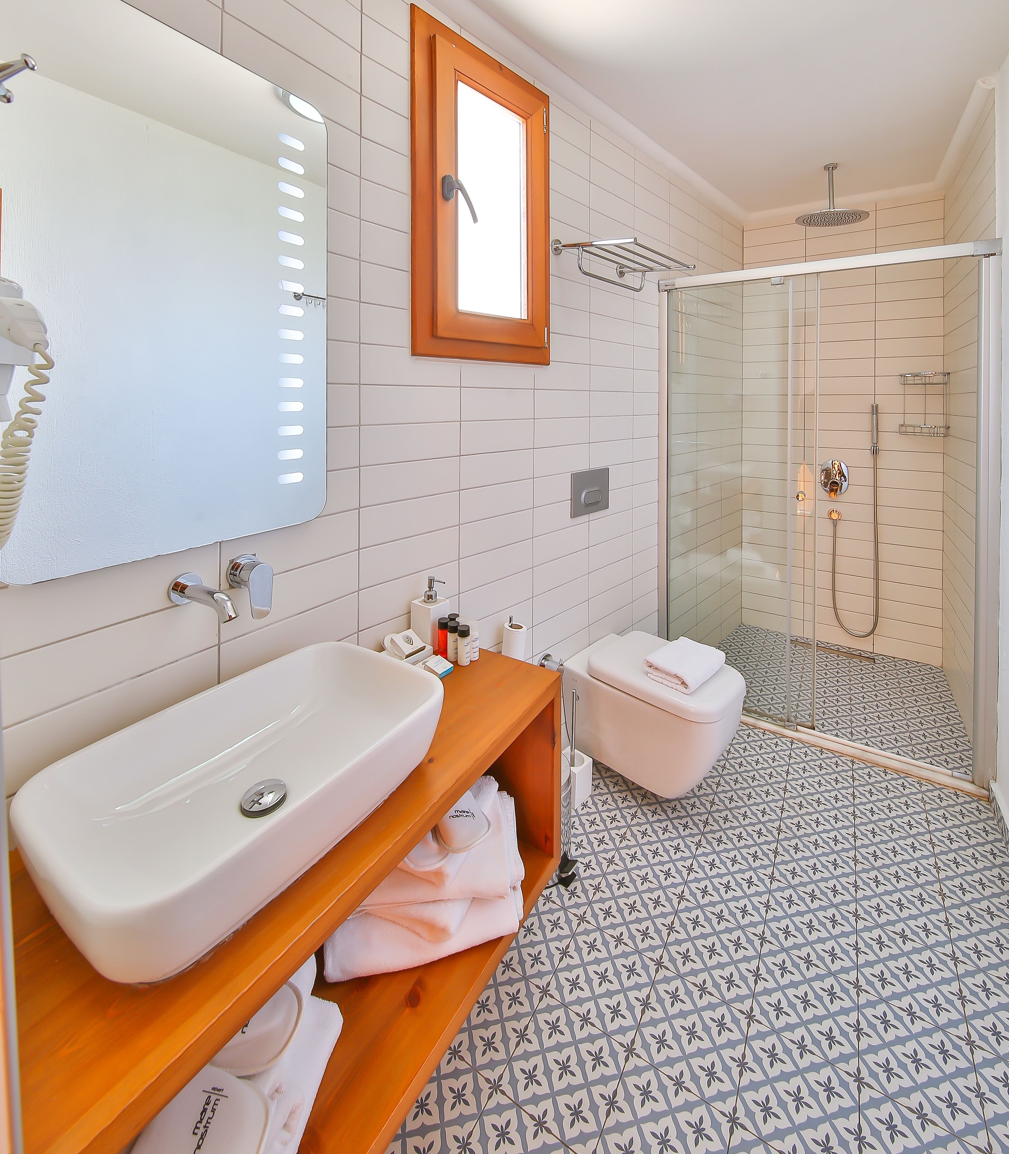 shower, free toiletries, hair dryer, slippers