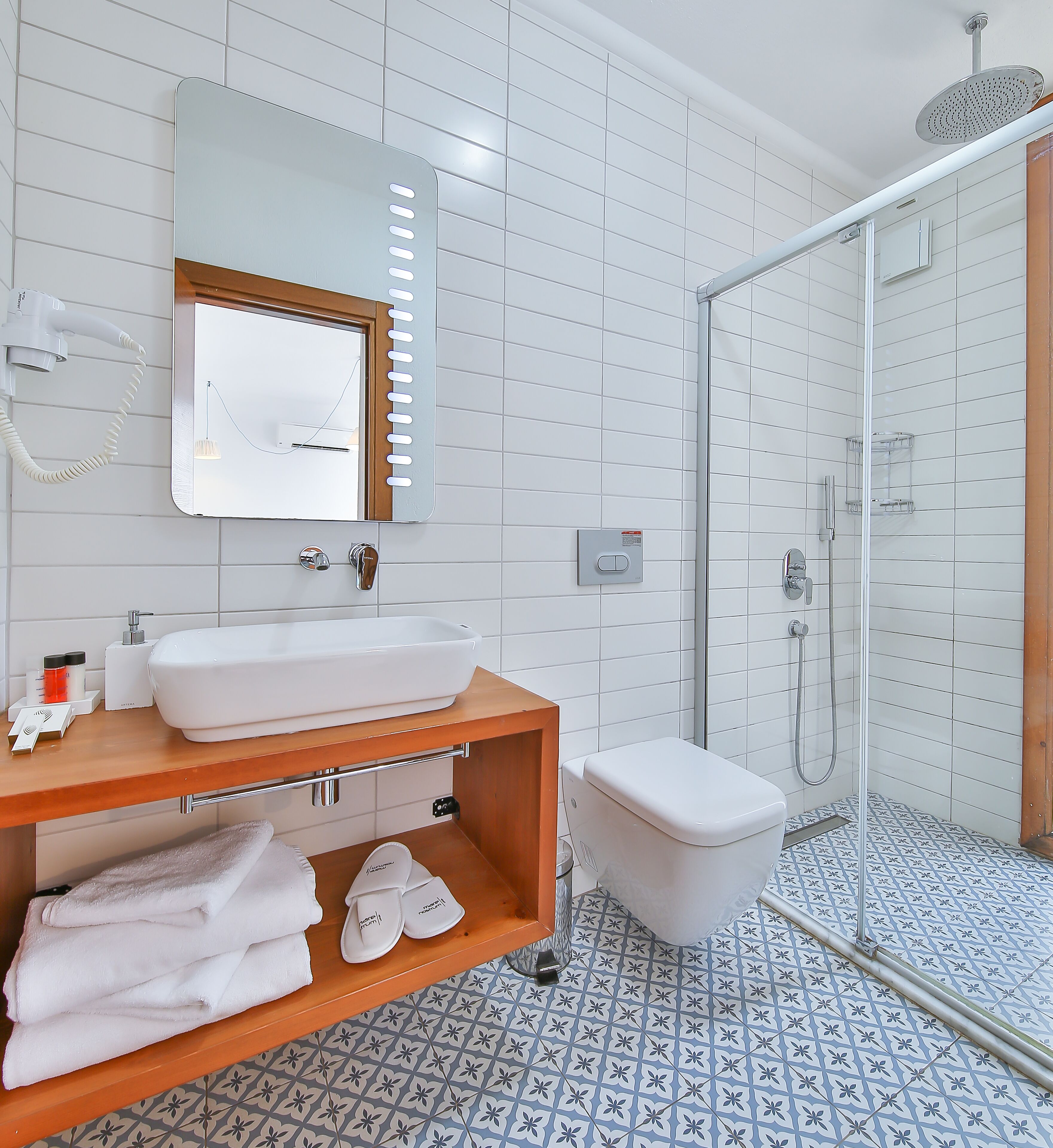 shower, free toiletries, hair dryer, slippers