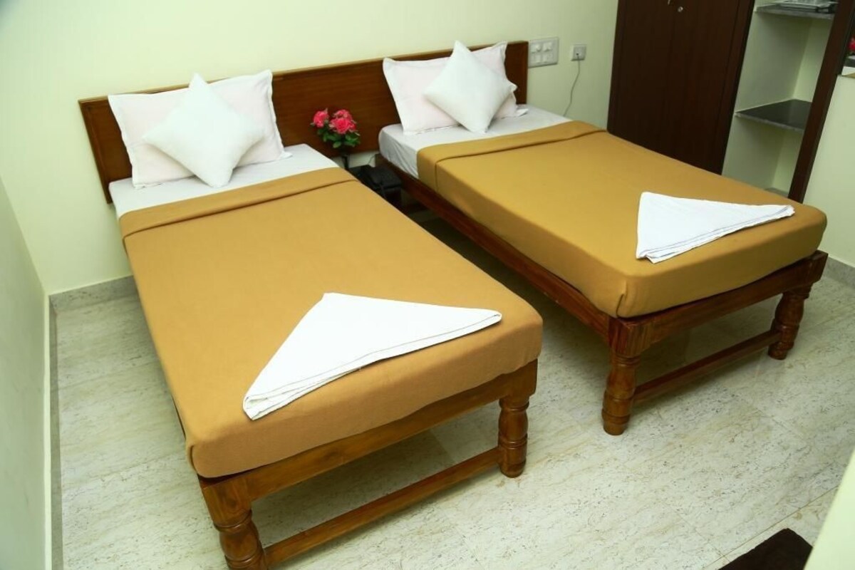 Kamar Twin Deluks, 2 kamar tidur | 2 kamar tidur, meja kerja, setrika/meja setrika, dan tempat tidur bayi