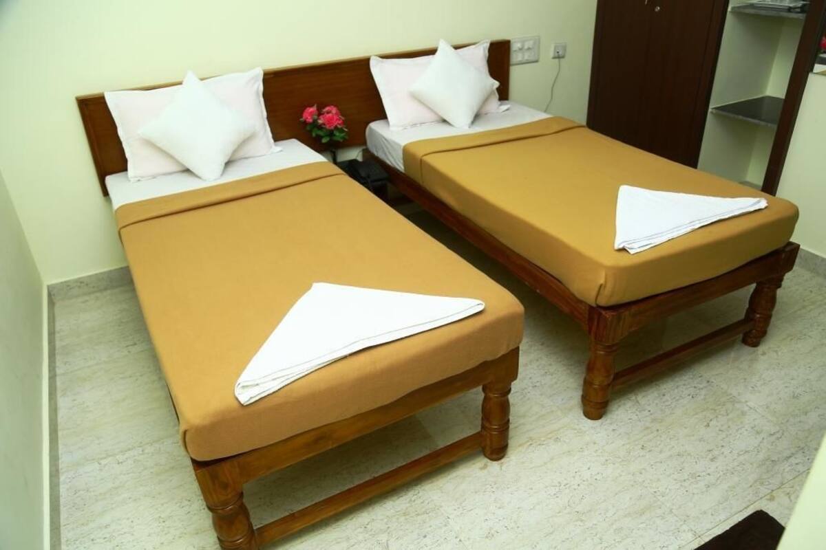 Chambre Deluxe avec lits jumeaux, 2 chambres | 2 chambres, bureau, fer et planche à repasser, lits bébé