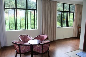 Family Quad Room | Living area