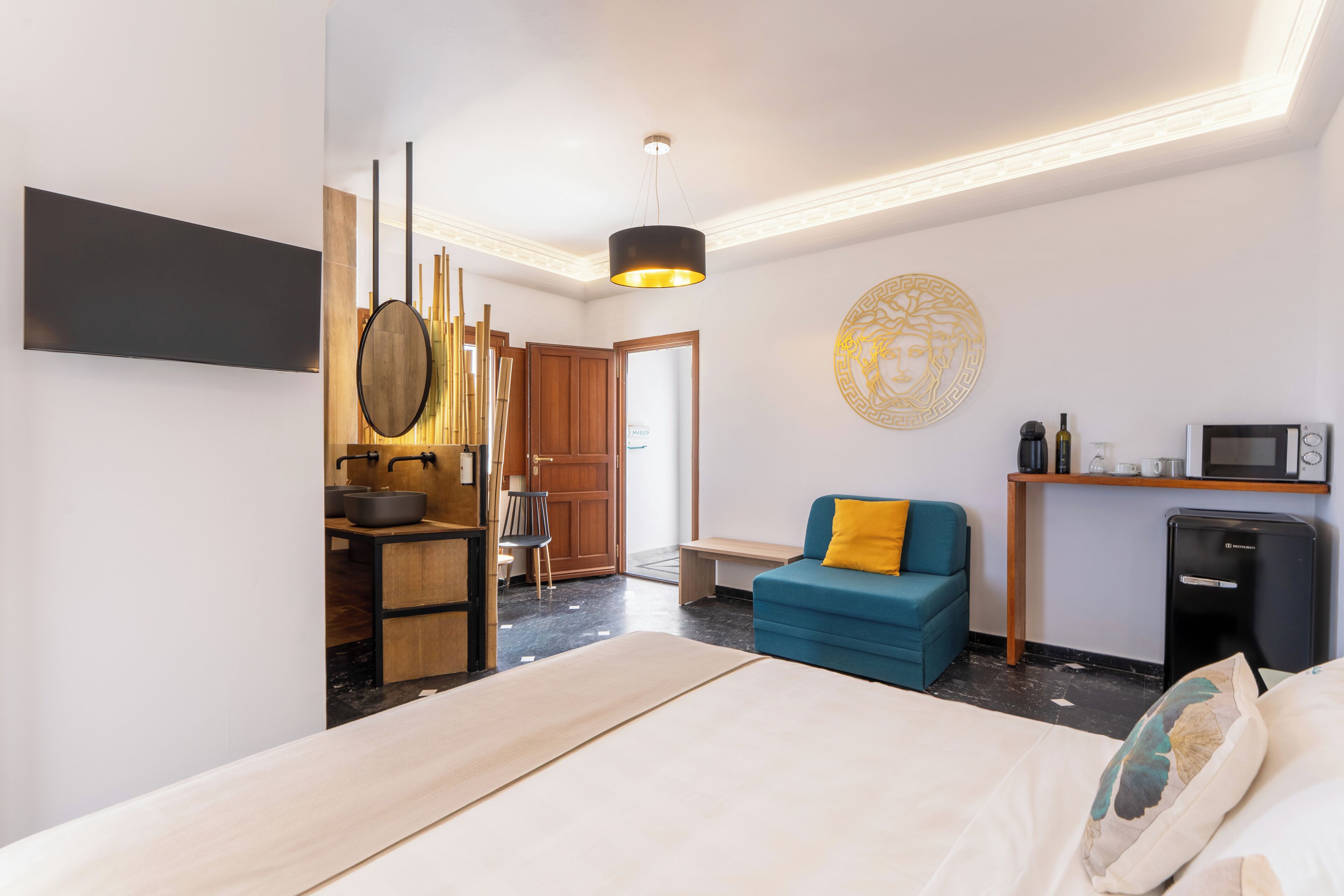 suite (medusa) | living area | 24-inch led tv with satellite channels, tv