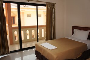 Basic Twin Room, 2 Single Beds | Desk, laptop workspace, blackout curtains, free WiFi - Chaleunehoung Hotel (Vientiane)