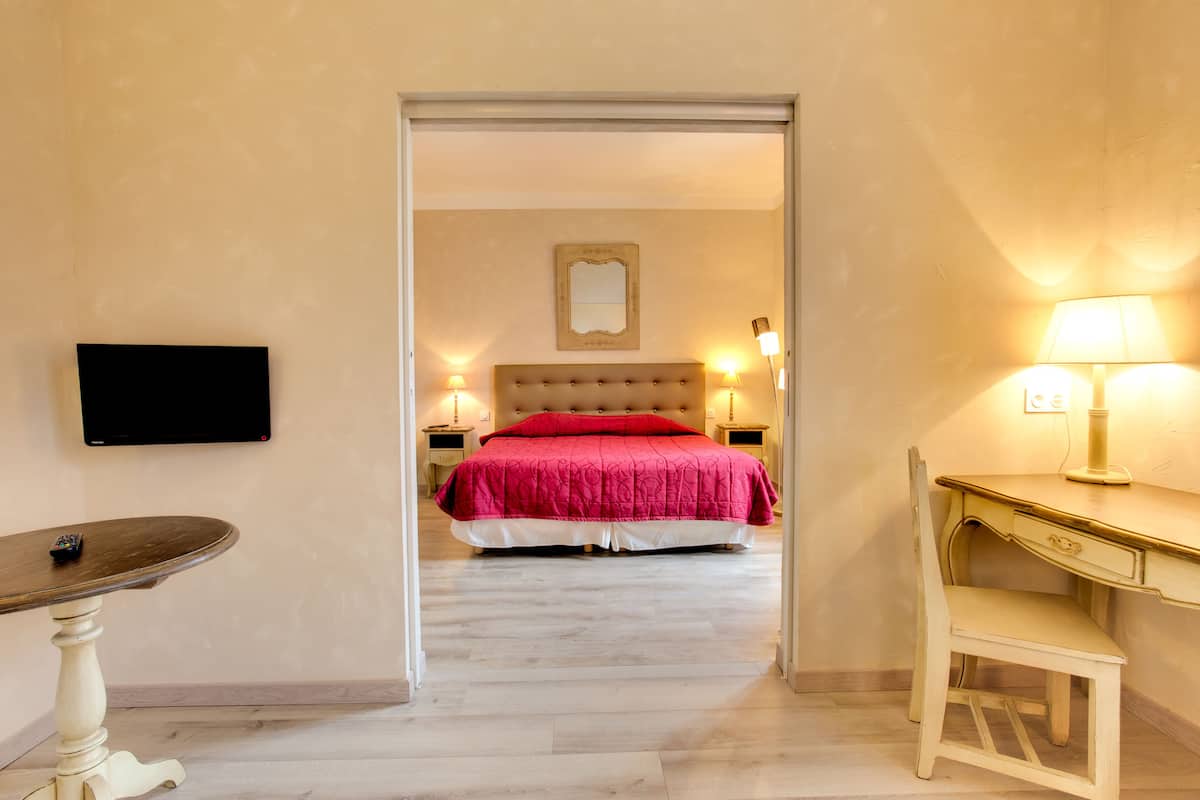 junior suite | 1 bedroom, individually decorated, individually furnished, desk