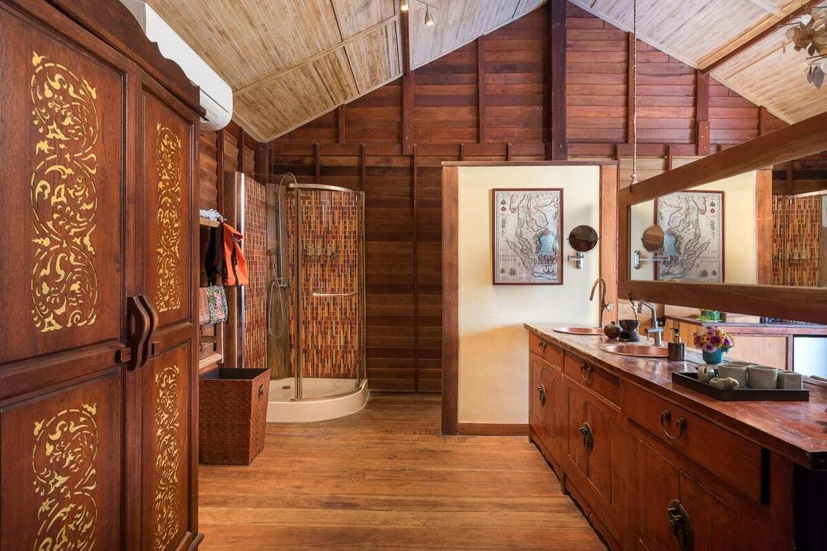 grand deluxe pool villa | bathroom | shower, hair dryer, bathrobes, slippers