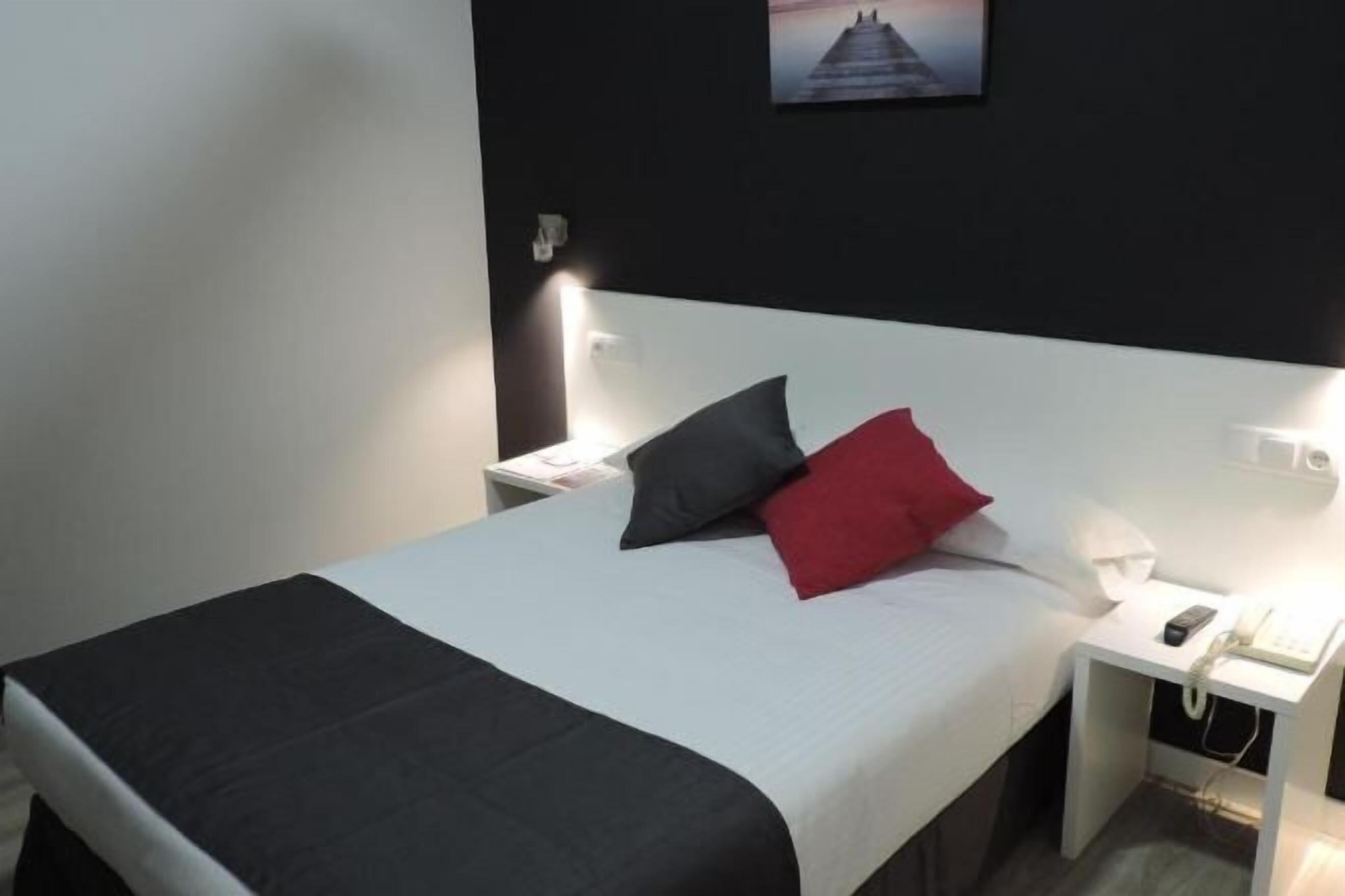 Desk, blackout curtains, free cots/infant beds, rollaway beds