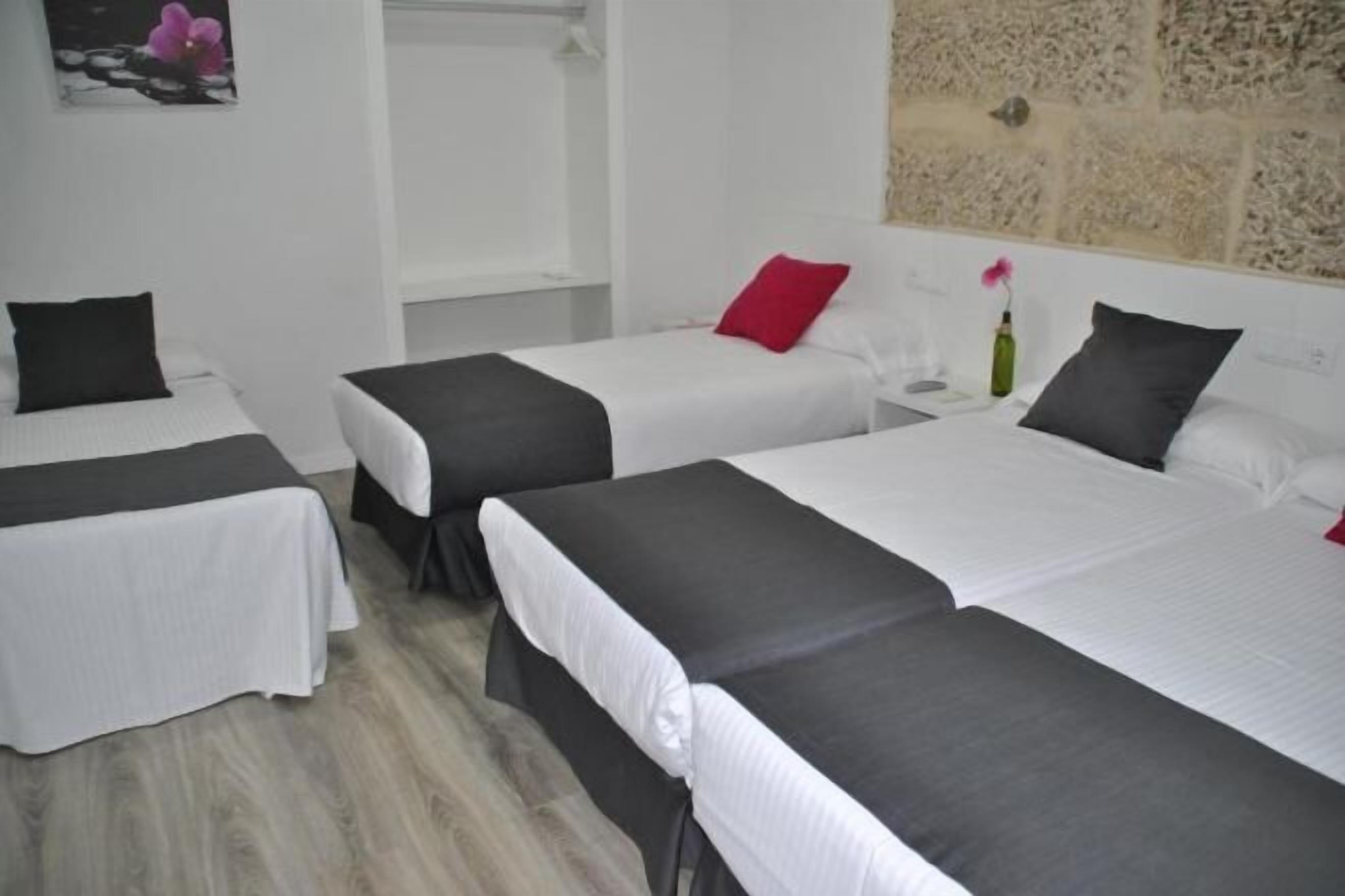 Desk, blackout curtains, free cots/infant beds, rollaway beds