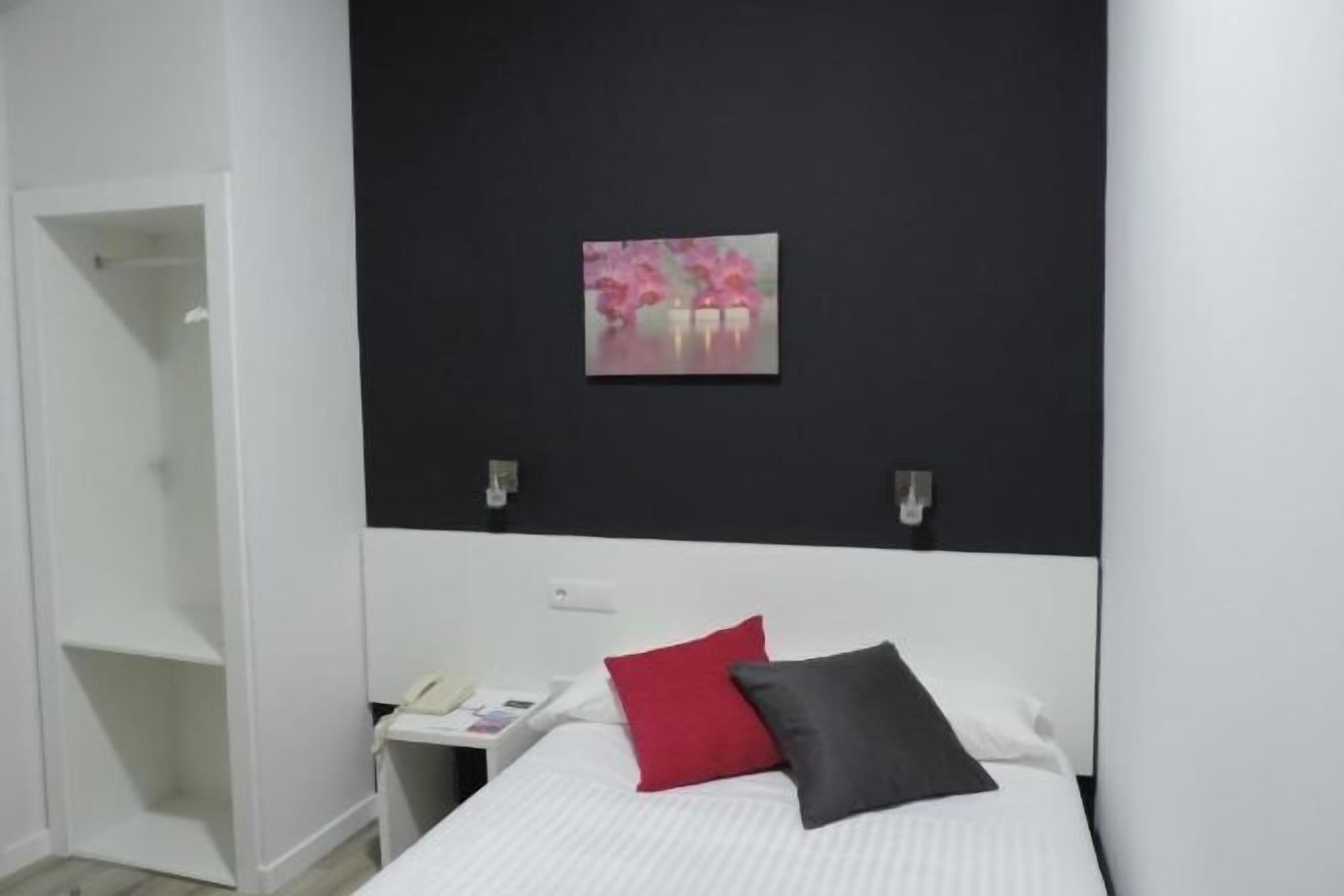 Desk, blackout curtains, free cots/infant beds, rollaway beds