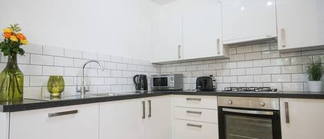 Superior Apartment, 2 Bedrooms | Private kitchen | Full-size fridge, microwave, stovetop, dishwasher