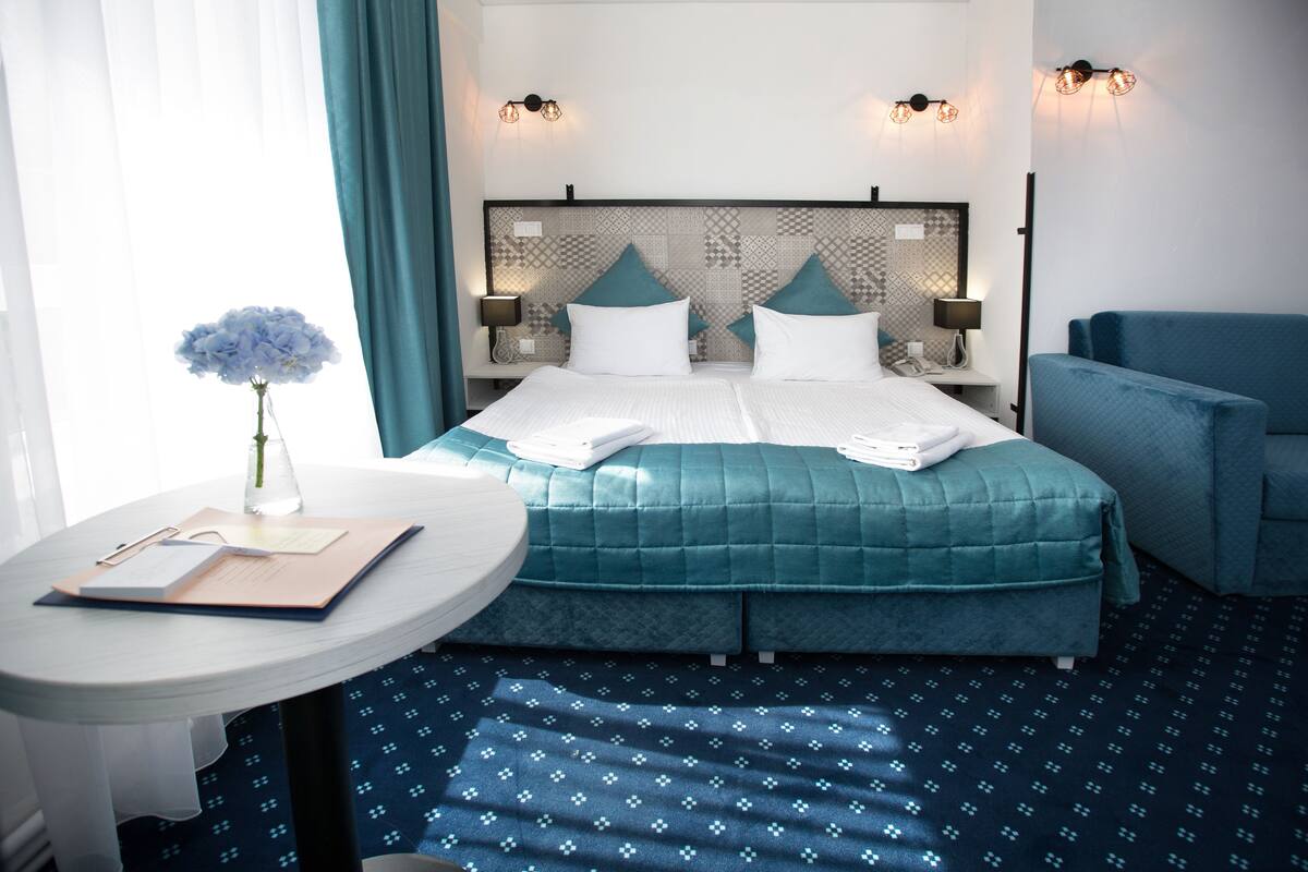 Apartemen Keluarga, 1 kamar tidur, dapur kecil | 1 kamar tidur, brankas, tempat tidur lipat/tambahan, dan Wi-Fi gratis