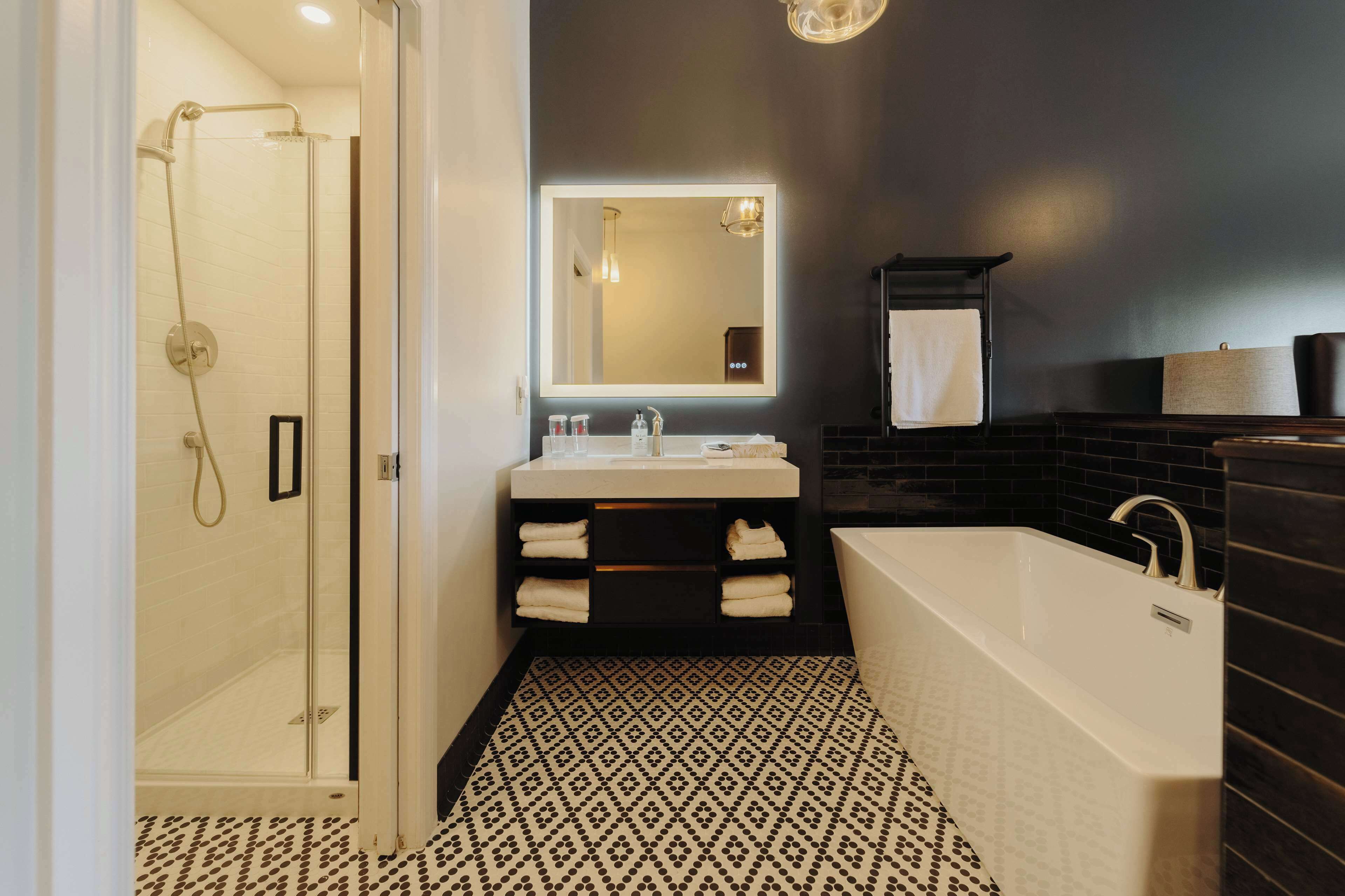 designer toiletries, hair dryer, towels, soap