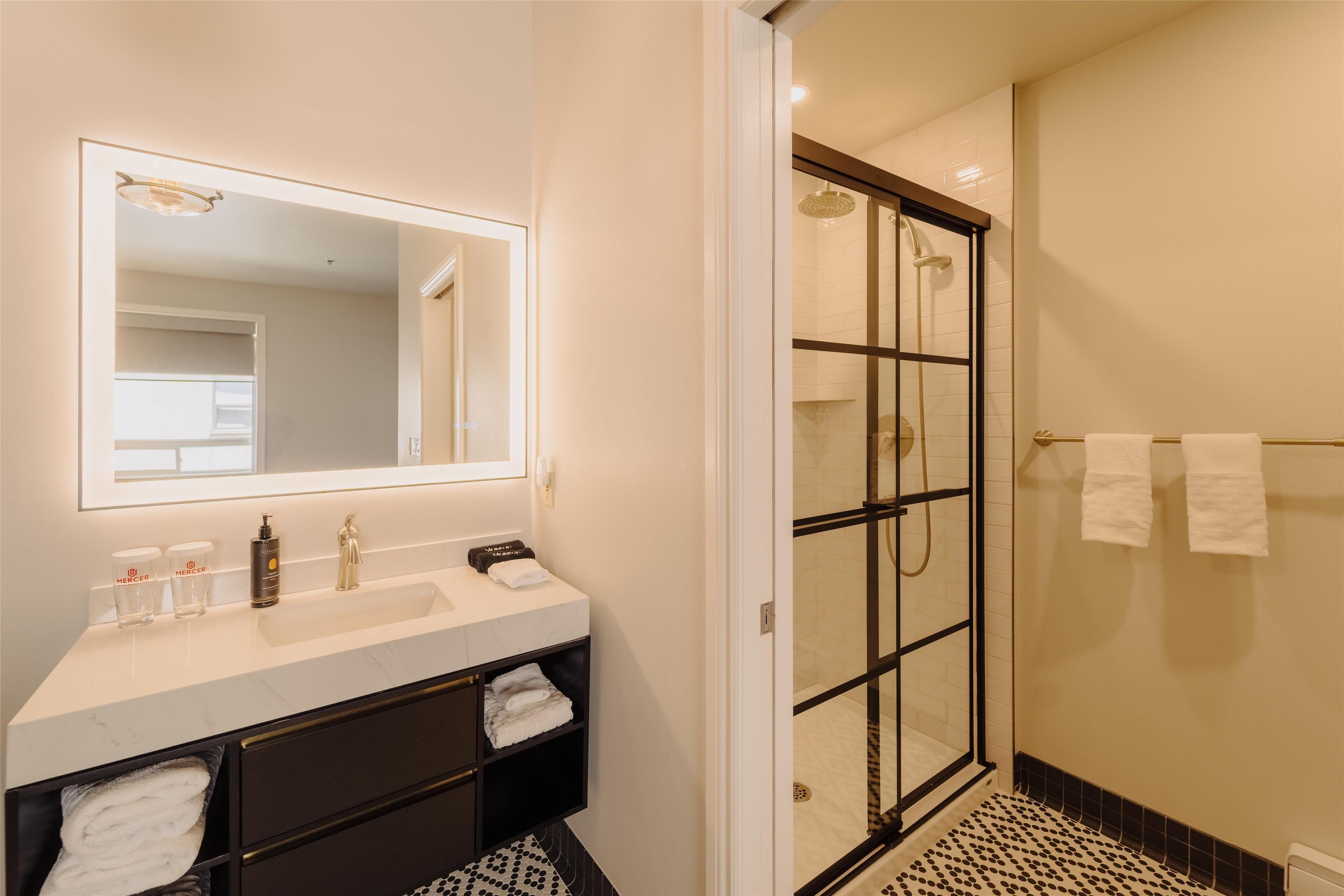 standard room, 1 king bed, non smoking (walk-in shower) | bathroom | designer toiletries, hair dryer, towels, soap