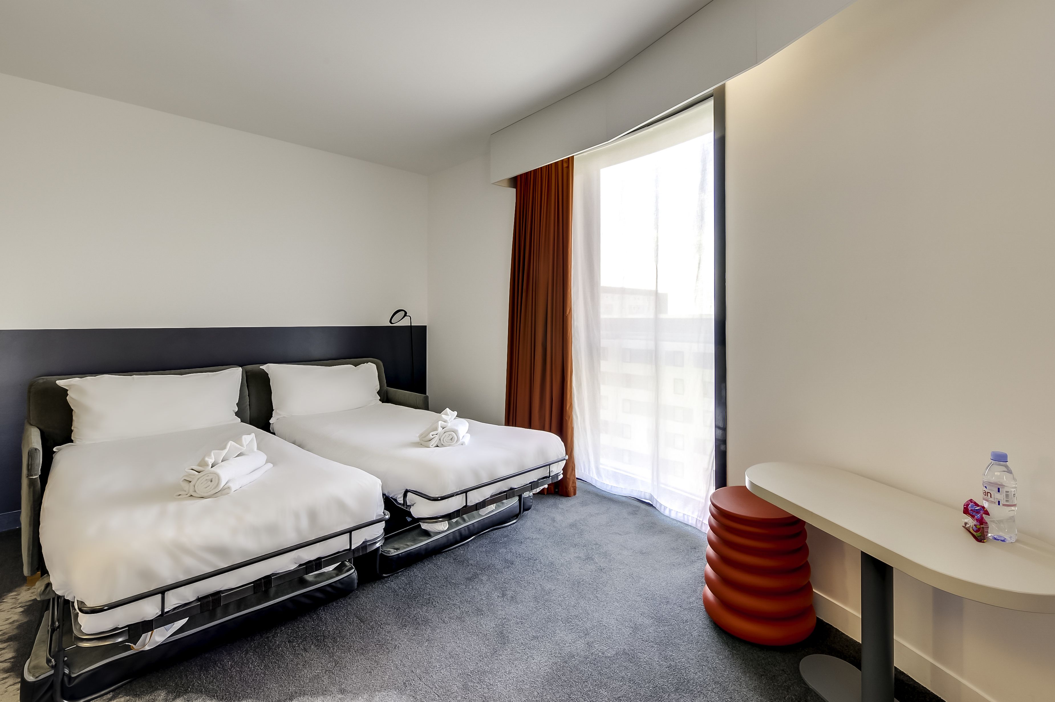 junior suite, multiple beds | living room | lcd tv