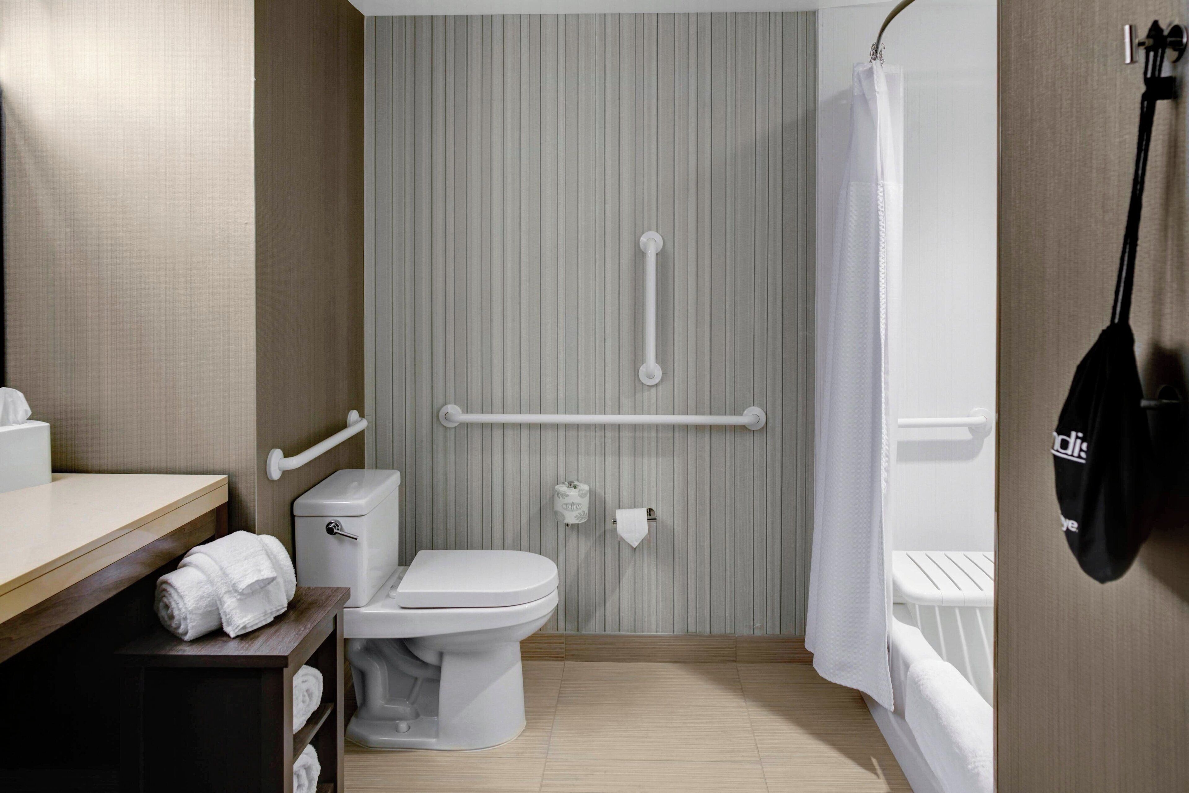 room, 2 queen beds | bathroom | combined shower/bathtub, free toiletries, hair dryer, towels