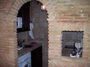 Private kitchen - Apartamentos Turísticos Doña María la Brava (Plasencia)