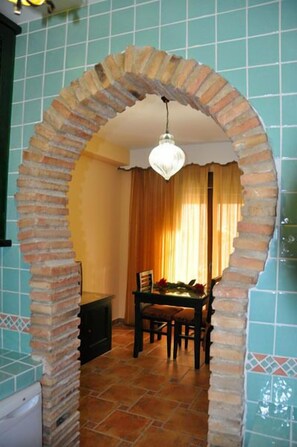In-room dining - Apartamentos Turísticos Doña María la Brava (Plasencia)