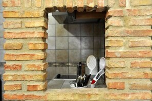 Apartamento, 1 quarto | Cozinha privada | Geladeira, micro-ondas, cooktop, cafeteira/chaleira