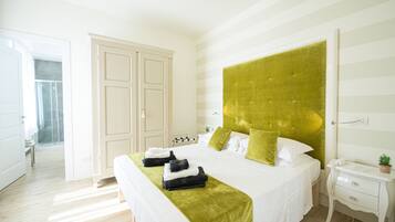 Premium bedding, down comforters, pillowtop beds, minibar