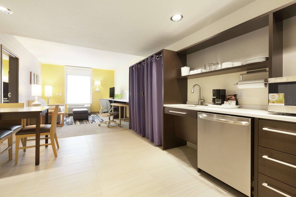 suite, 1 king bed, accessible (hearing) | in-room safe, desk, laptop workspace, free cots/infant beds