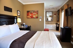 Habitación superior, 1 cama de matrimonio, bañera de hidromasaje | Escritorio y wifi gratis