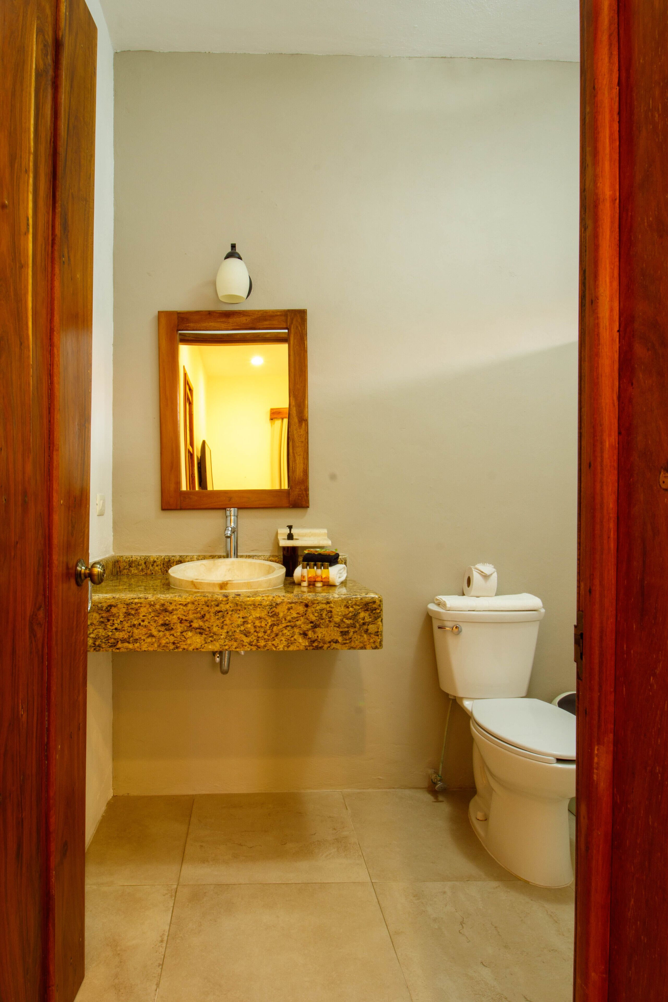 luxury room, 1 king bed, non smoking, pool view | bathroom | shower, free toiletries, hair dryer, towels