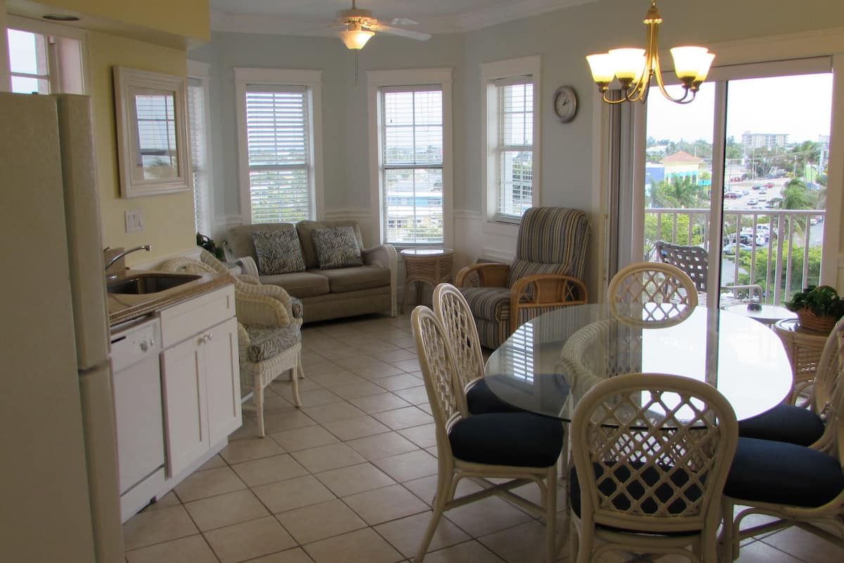 Apartment, 2 Bedrooms, Partial Ocean View | In-room safe, desk, laptop workspace, iron/ironing board