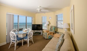Apartment, Multiple Beds, Partial Ocean View | In-room safe, desk, laptop workspace, iron/ironing board - Edison Beach House (Fort Myers Beach)