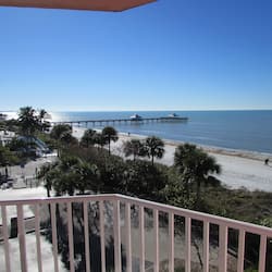 Studio, 1 Queen Bed, Partial Ocean View | In-room safe, desk, laptop workspace, iron/ironing board