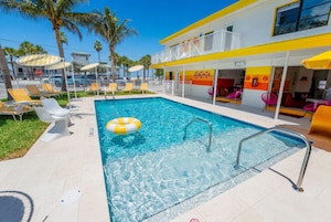 Outdoor pool, pool umbrellas, pool loungers