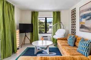 デラックス ペントハウス | リビング エリア | 薄型テレビ