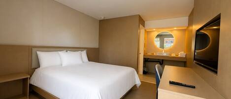 Deluxe Room, 1 Queen Bed, Non Smoking (in room) | Desk, iron/ironing board, free WiFi, bed sheets