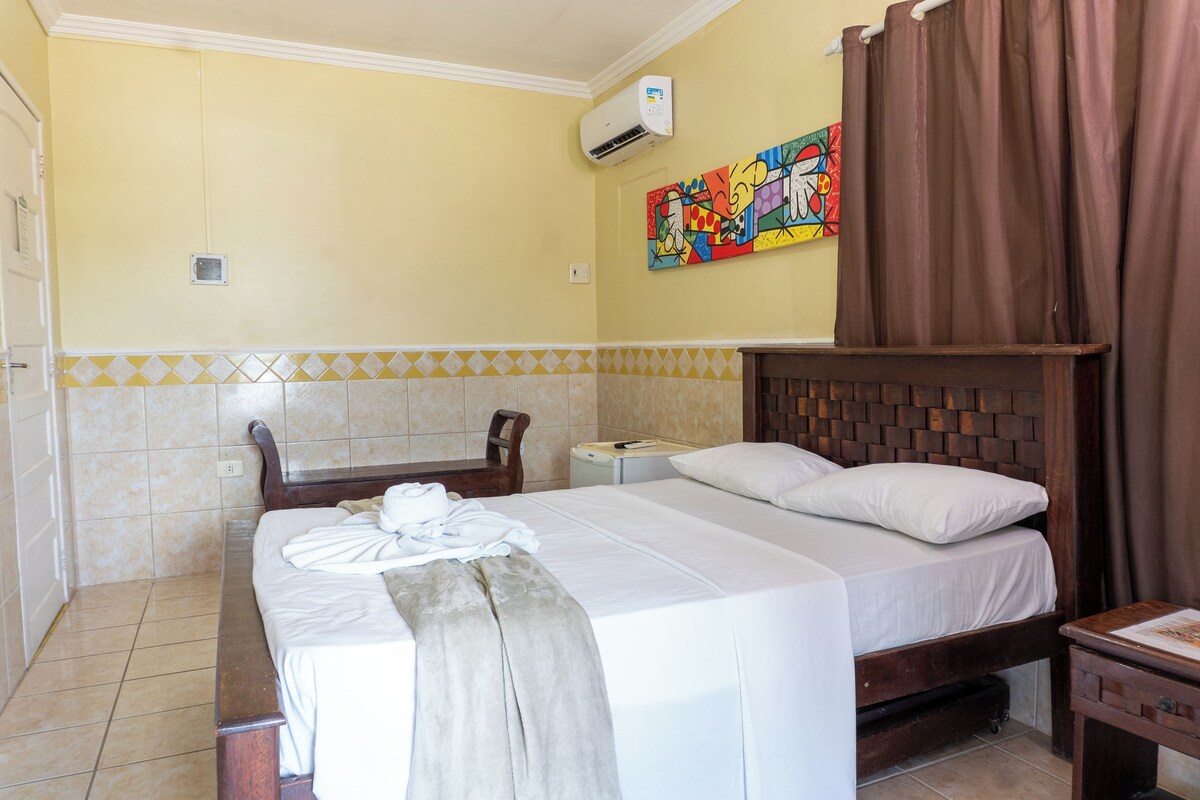 Standard Double Room | Minibar, in-room safe, blackout drapes, iron/ironing board (on request)