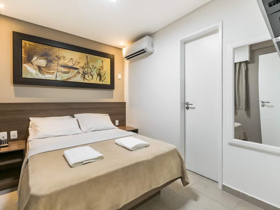 Suite (Master Flat) | Minibar, blackout drapes, soundproofing, iron/ironing board