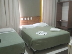 Triple Room | Minibar, in-room safe, desk, laptop workspace