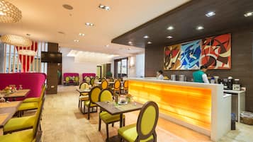 Breakfast, lunch, dinner served; international cuisine