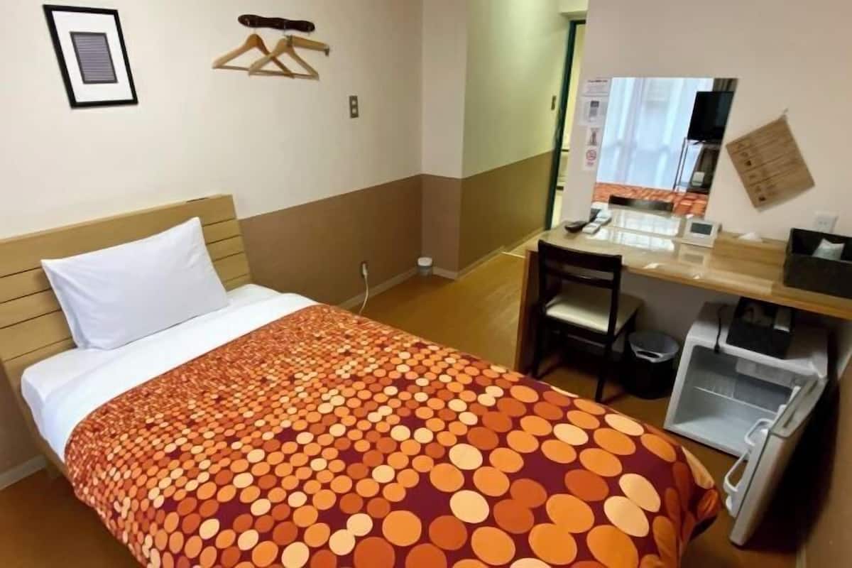 Desk, blackout curtains, free cots/infant beds, free WiFi