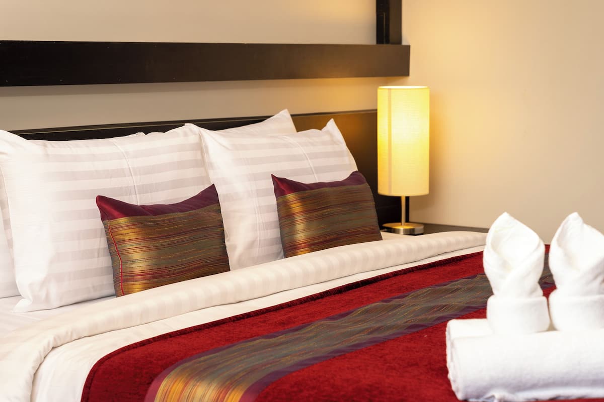 Family Room, 1 Bedroom | Minibar, in-room safe, individually decorated, desk