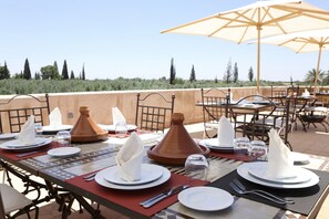 Breakfast, lunch, dinner served; Regional cuisine, pool views - Le Clos des Oliviers by KMV (Marrakech)