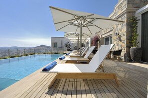 Outdoor pool, pool umbrellas, pool loungers