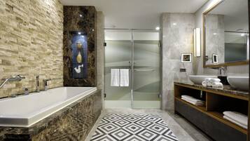 Designer toiletries, hair dryer, bathrobes, slippers