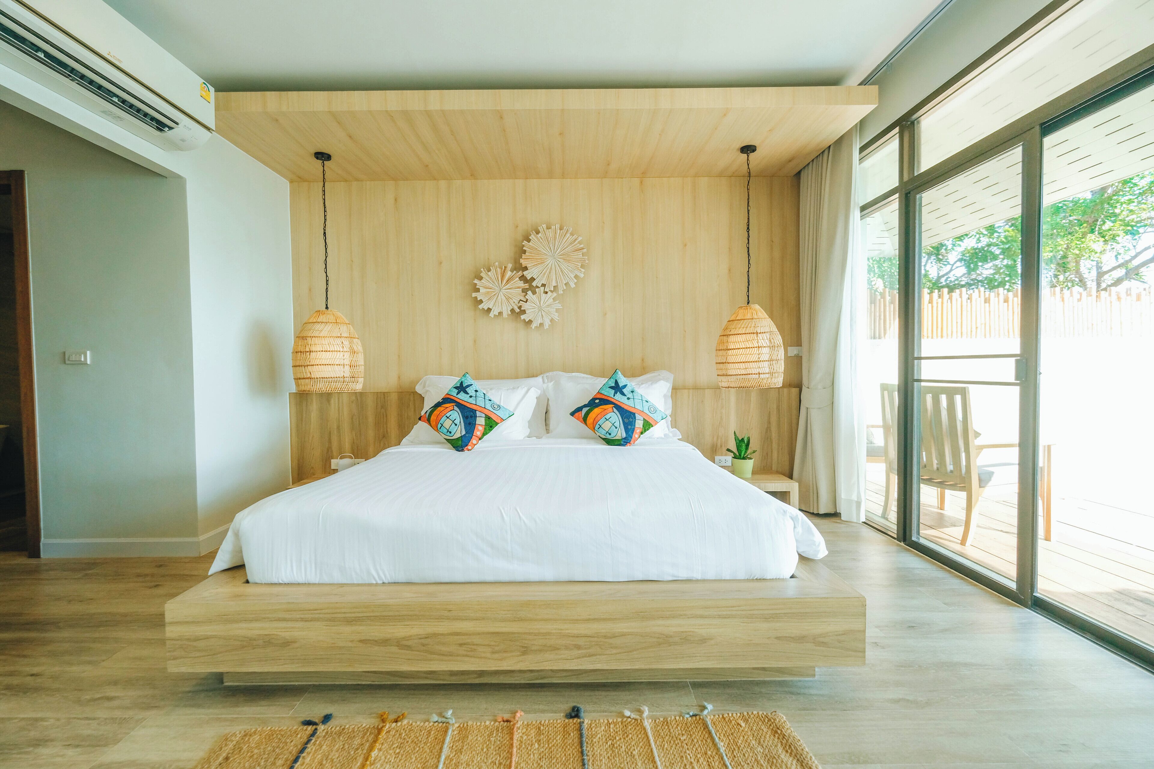 Sirarun Beachfront Pool Villa | Minibar, in-room safe, desk, blackout drapes