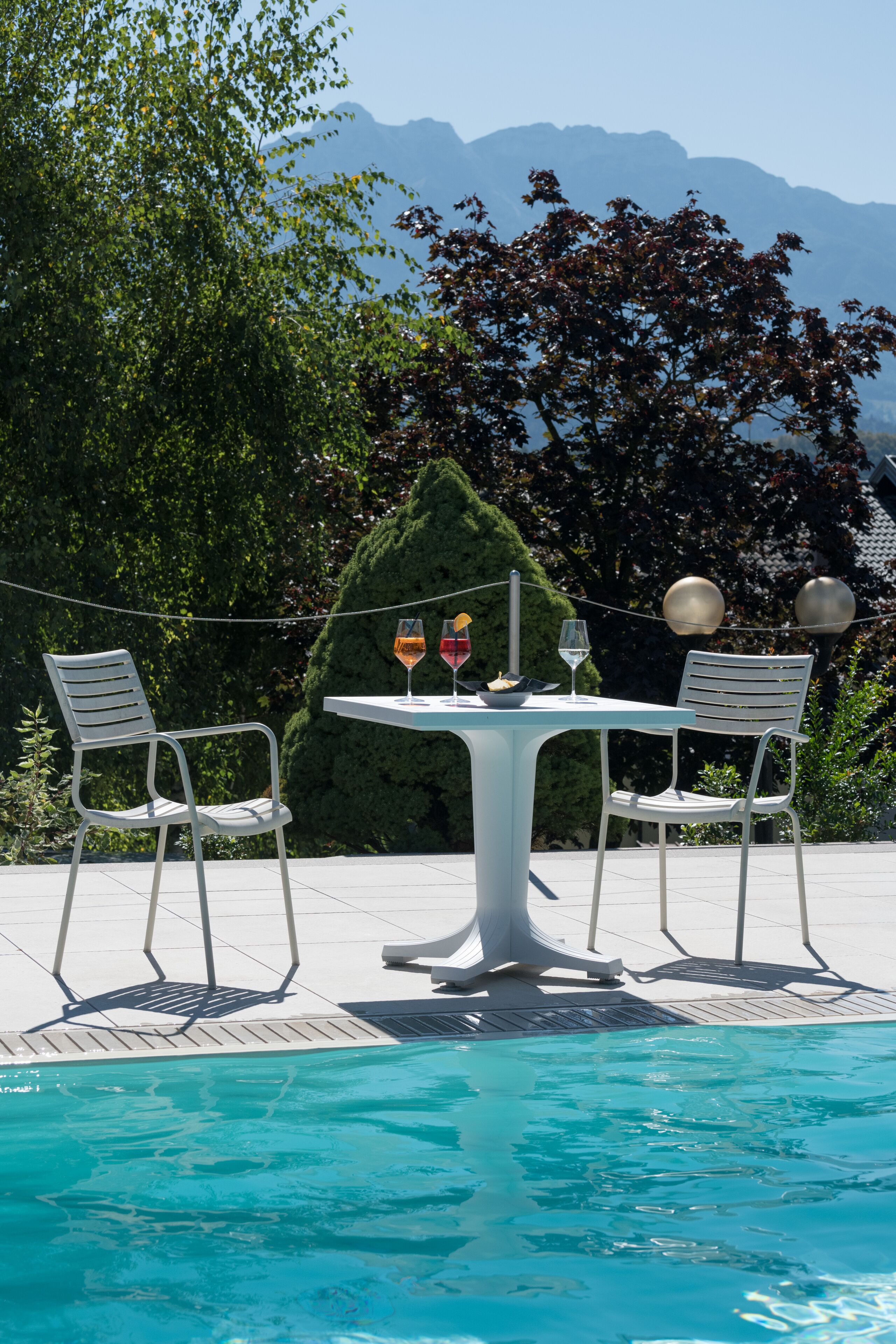 seasonal outdoor pool, pool umbrellas, pool loungers