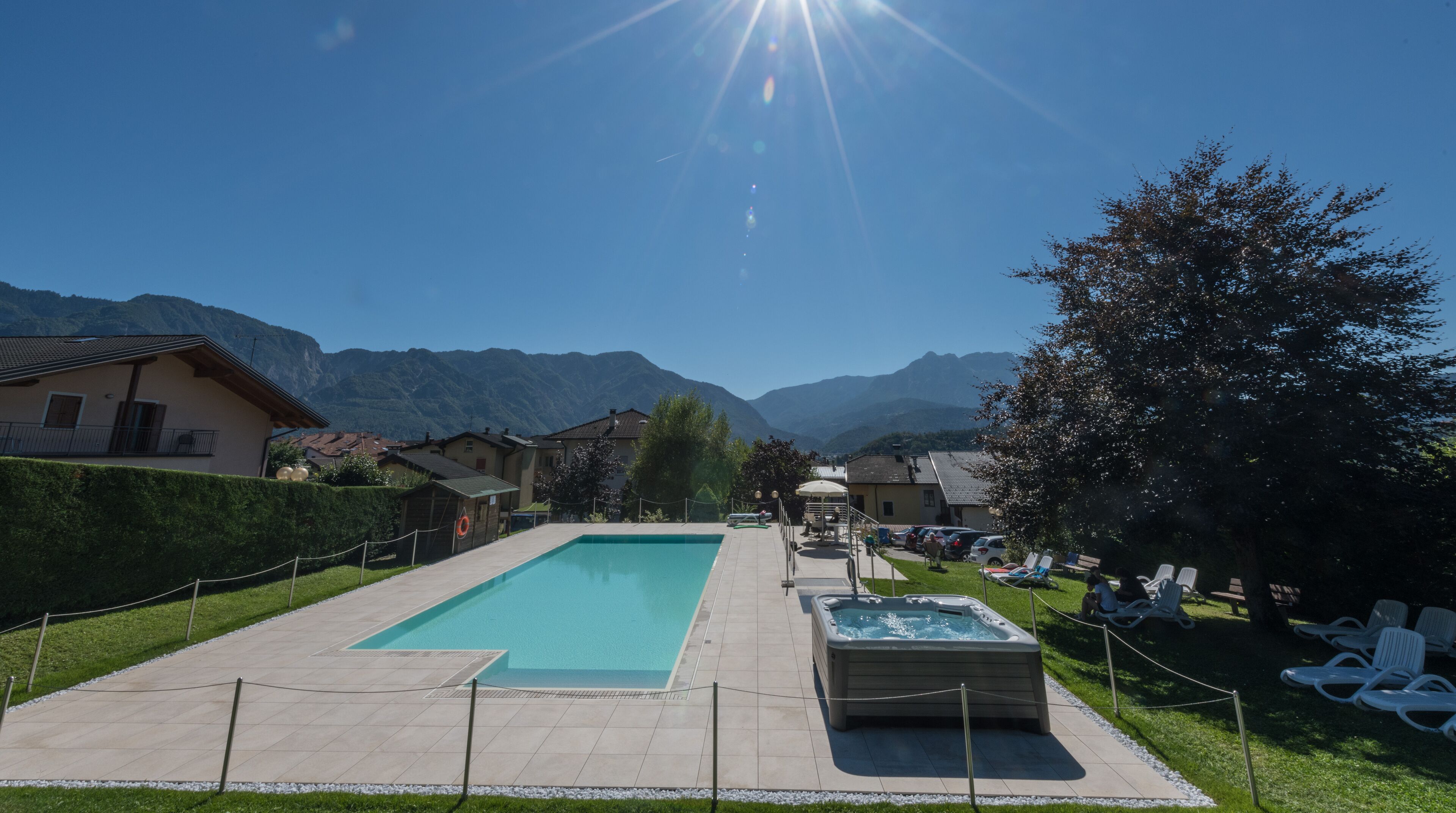 seasonal outdoor pool, pool umbrellas, pool loungers