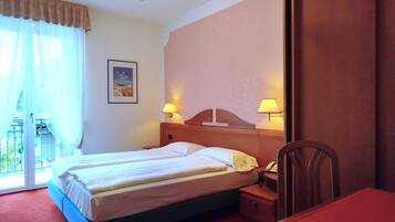 Classic Double Room, Balcony | In-room safe, desk, free WiFi, bed sheets