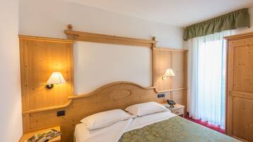 Camera Comfort con letto matrimoniale o 2 letti singoli | Una cassaforte in camera, una scrivania, Wi-Fi gratuito, lenzuola