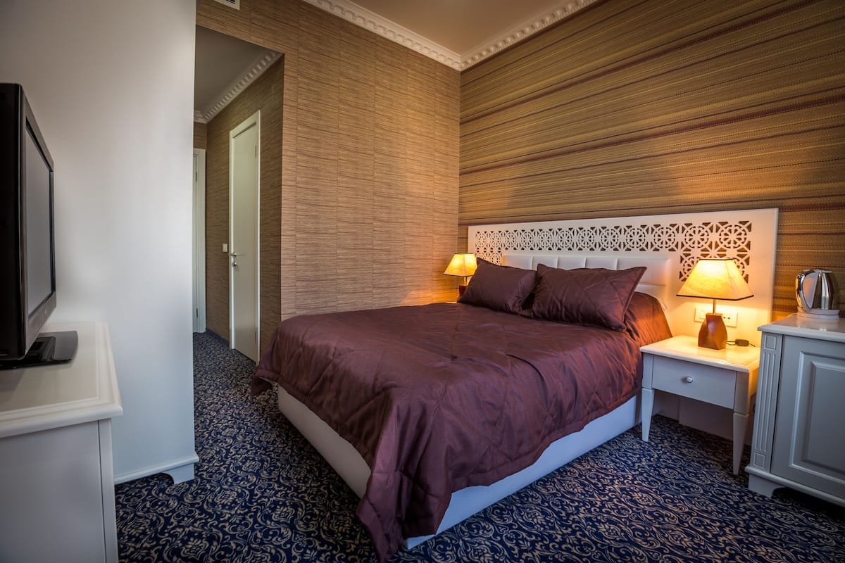Standaard tweepersoonskamer | Luxe beddengoed, een minibar, een kluis op de kamer