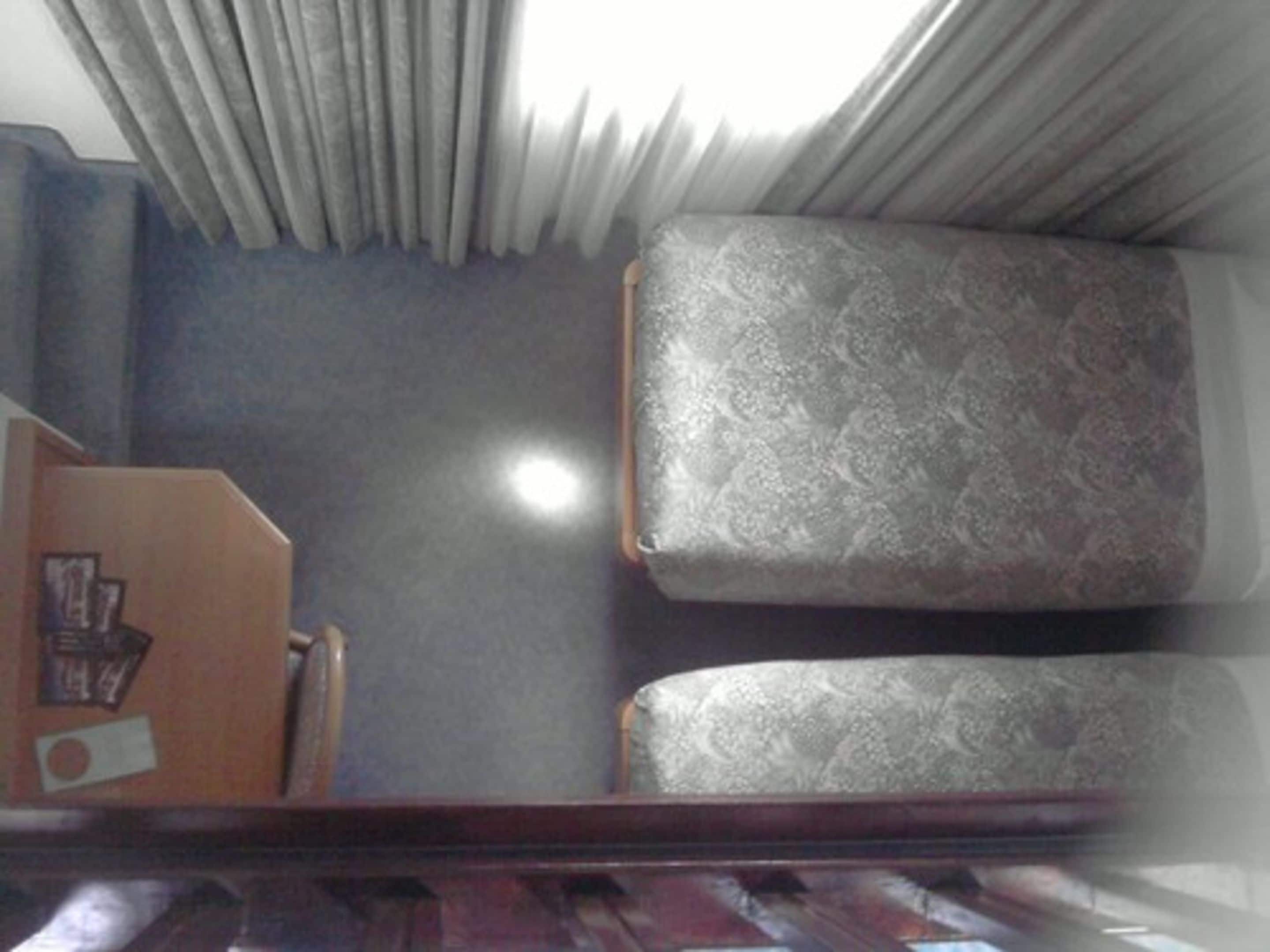 superior family room | desk, blackout curtains, soundproofing, free wifi