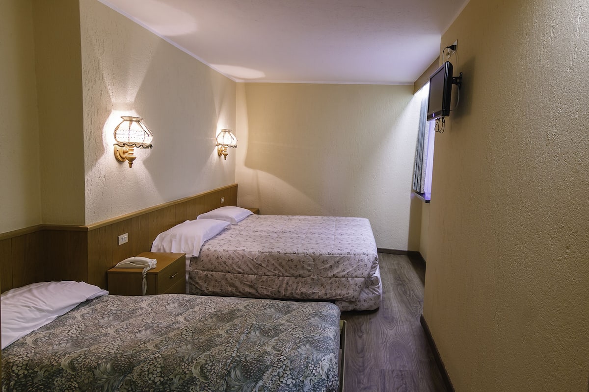 family room | desk, blackout curtains, soundproofing, free wifi