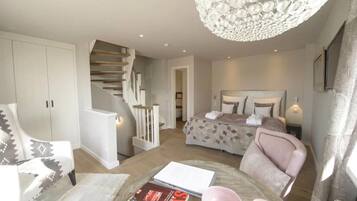 Premium bedding, free minibar items, in-room safe, iron/ironing board