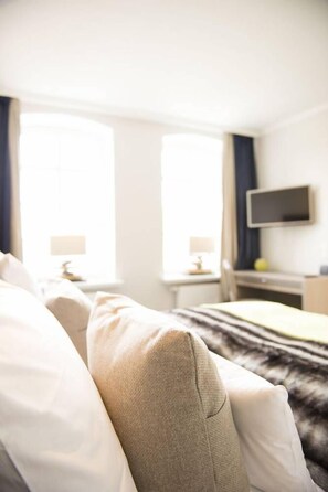 Ropa de cama de alta calidad y minibar (con algunos artículos gratuitos)